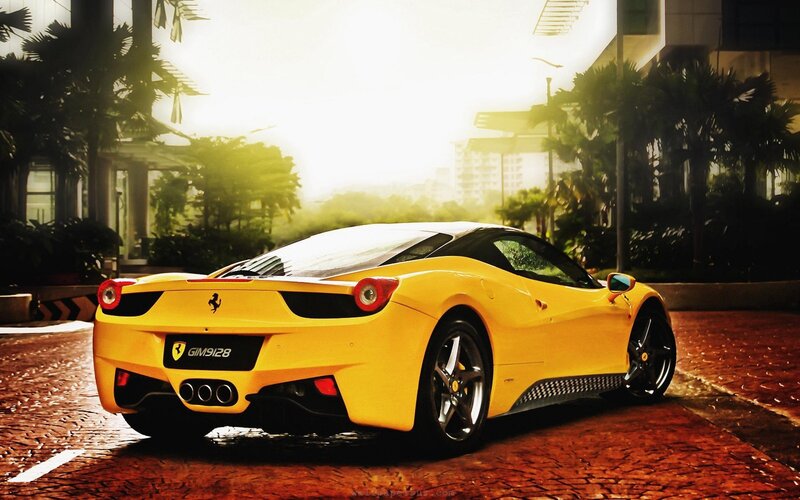 yellow ferrari sports car