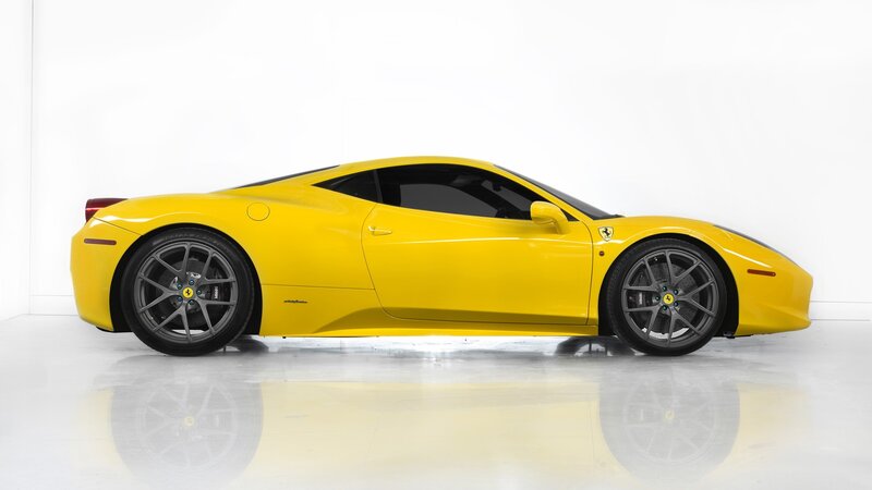 yellow ferrari sports car