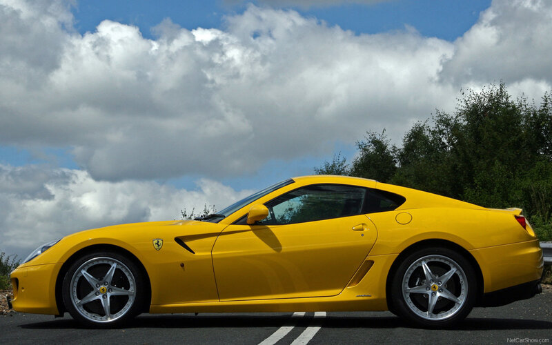 yellow ferrari sports car