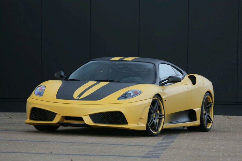 yellow ferrari sports car