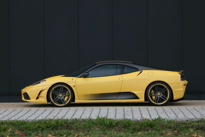 yellow ferrari sports car