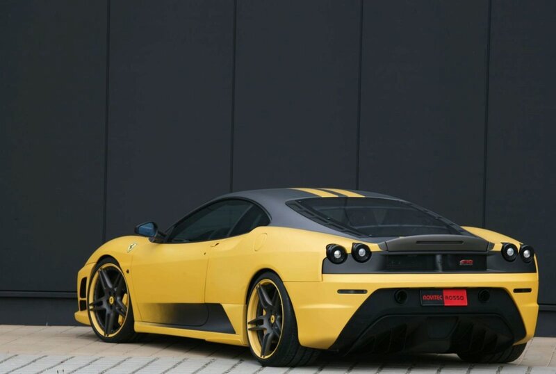 yellow ferrari sports car