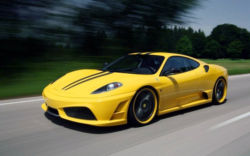 yellow ferrari sports car