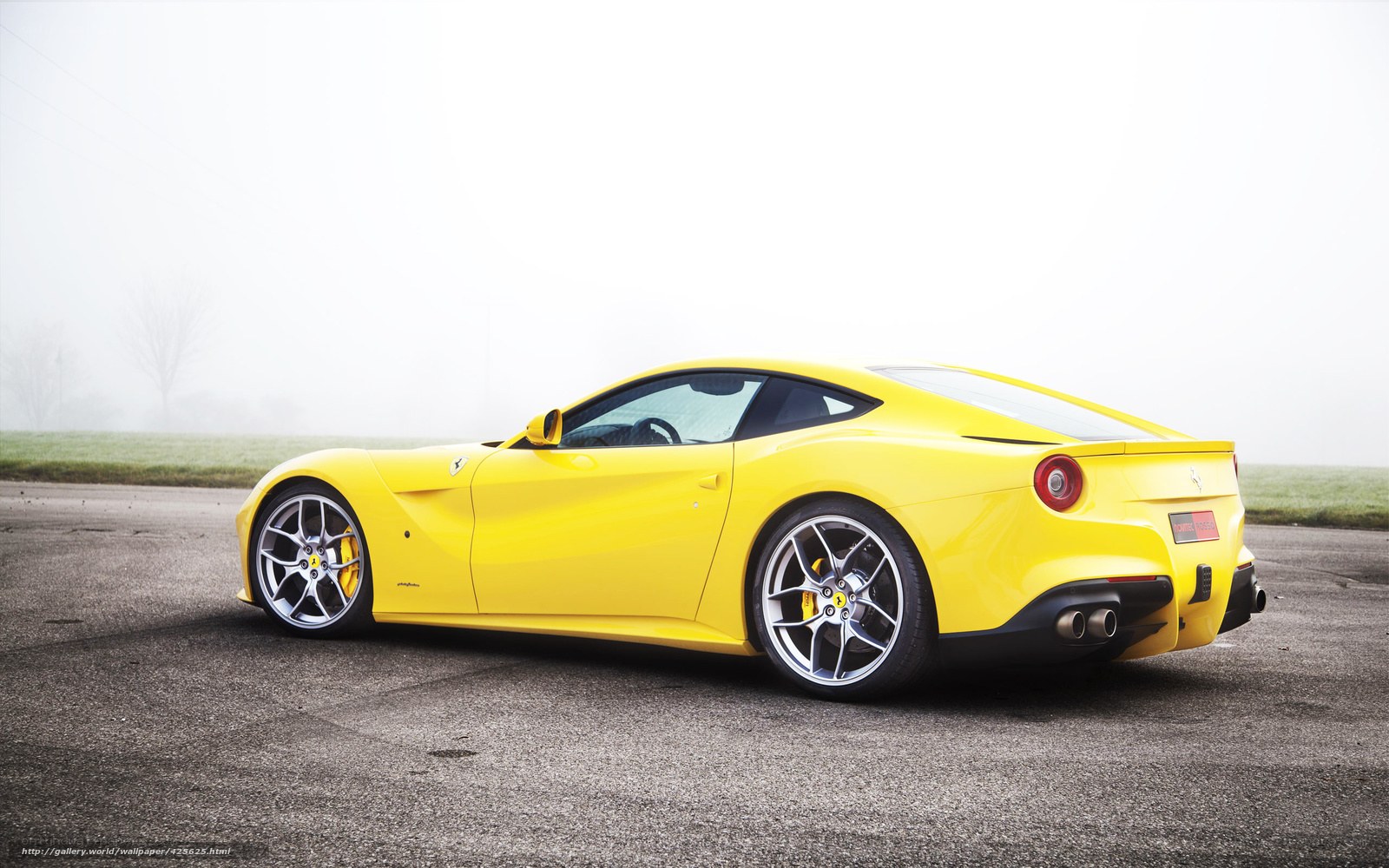 yellow ferrari sports car