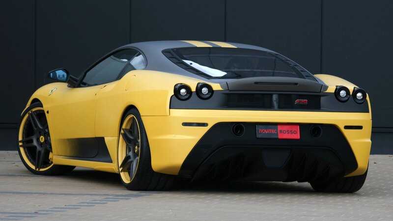 yellow ferrari sports car