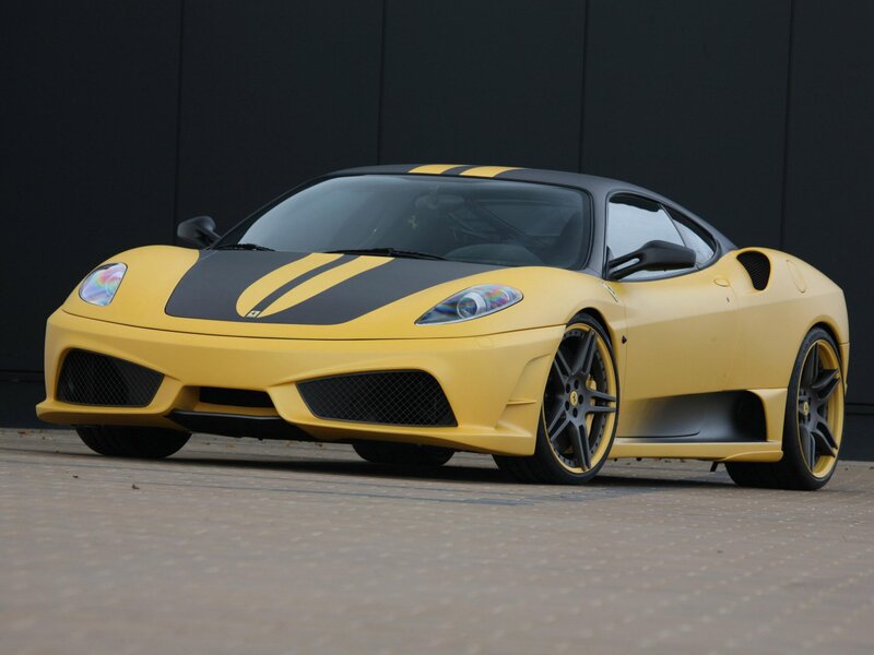 yellow ferrari sports car