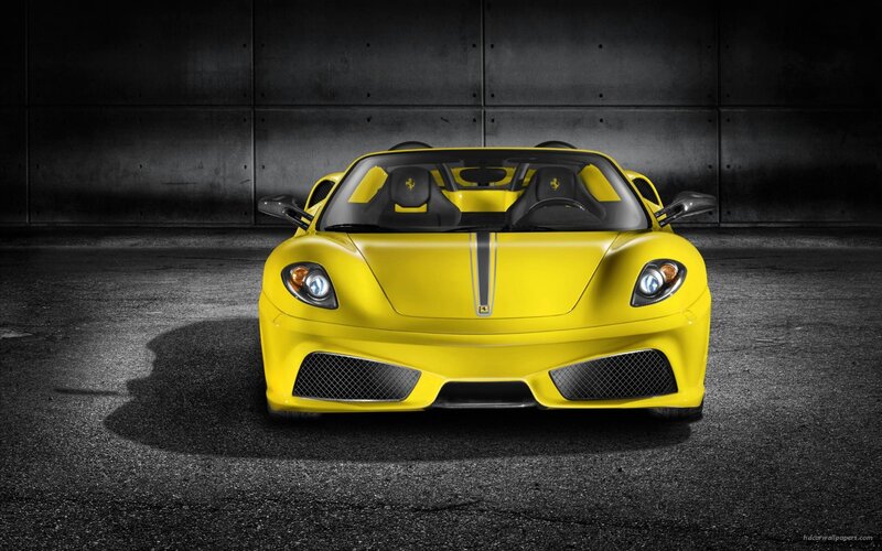 yellow ferrari sports car