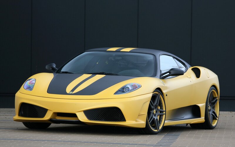 yellow ferrari sports car