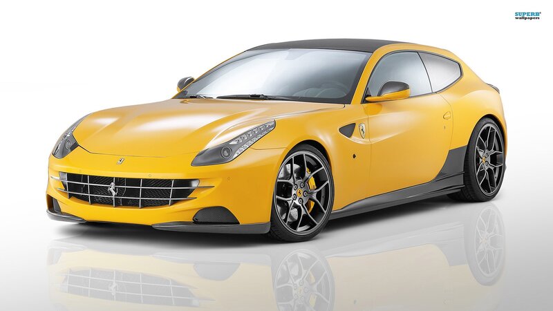 yellow ferrari sports car