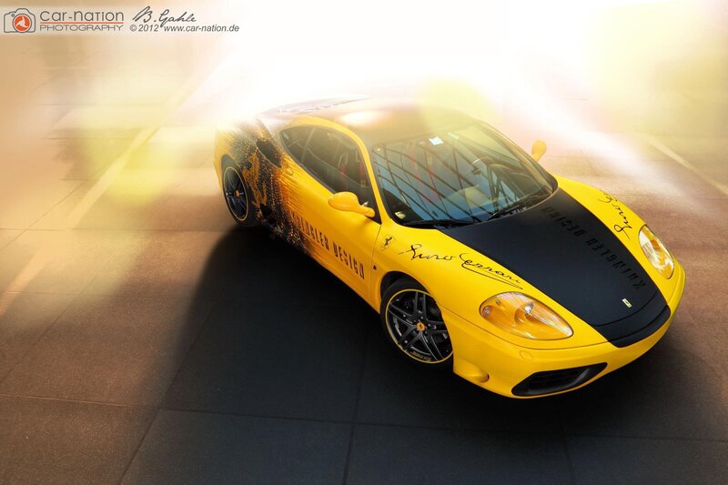 yellow ferrari sports car