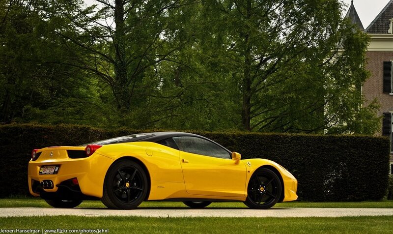 yellow ferrari sports car