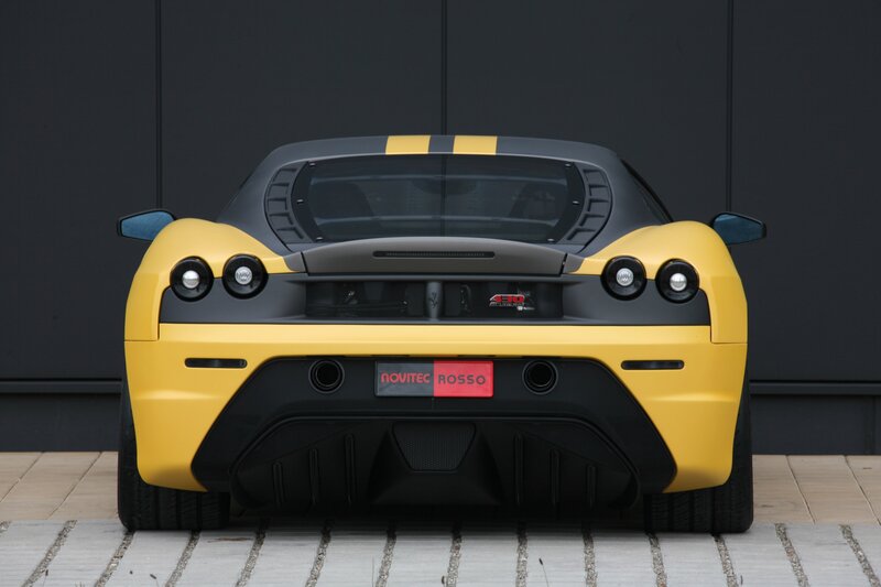 yellow ferrari sports car