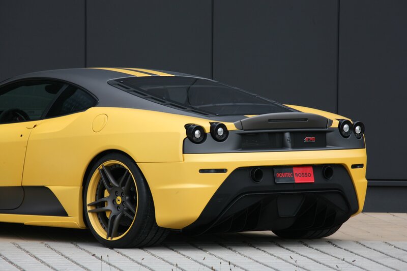 yellow ferrari sports car