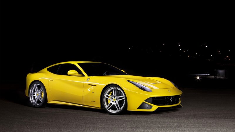yellow ferrari sports car