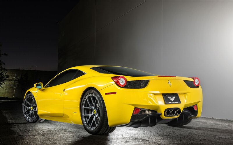 yellow ferrari sports car