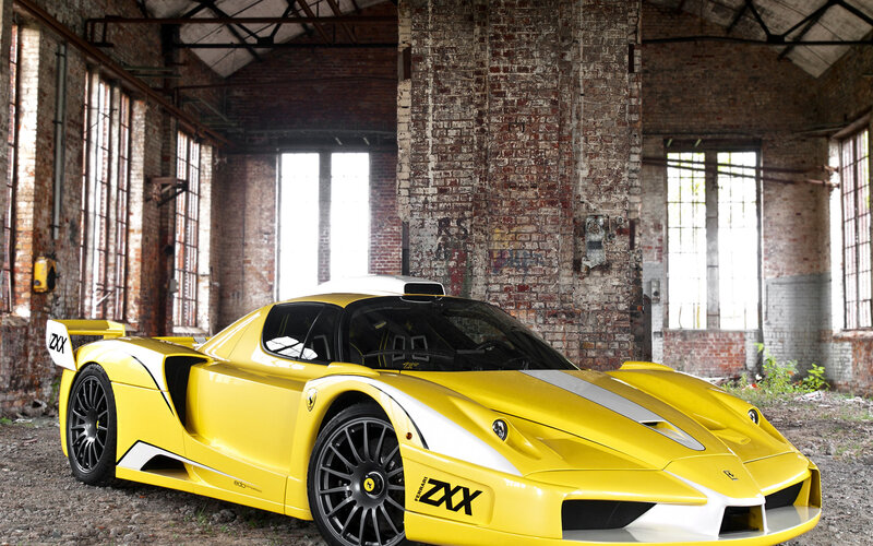 Yellow Ferrari Sports Car — Dramatic, Photograph, Brick Building