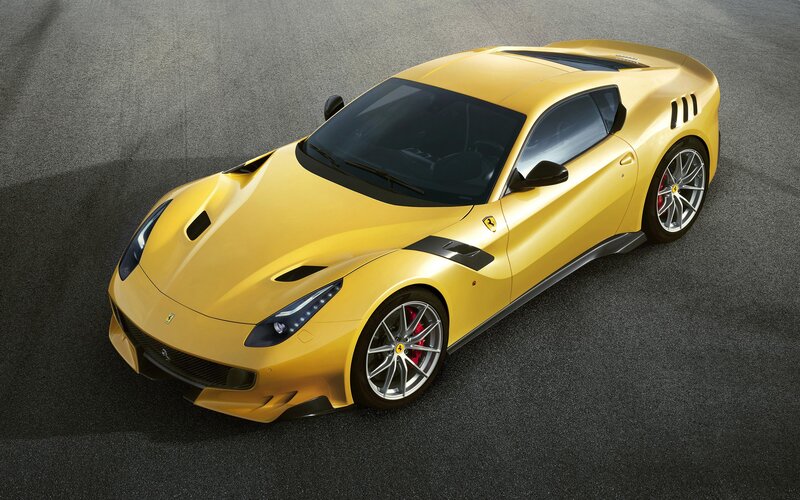 Yellow Ferrari Sports Car — Dramatic, Photograph, Road, Wheels