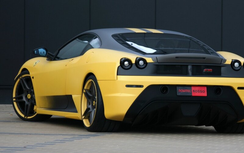 Yellow Ferrari Sports Car — Dramatic, Photograph, Wheels, Rear View