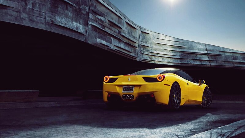 yellow ferrari under bridge