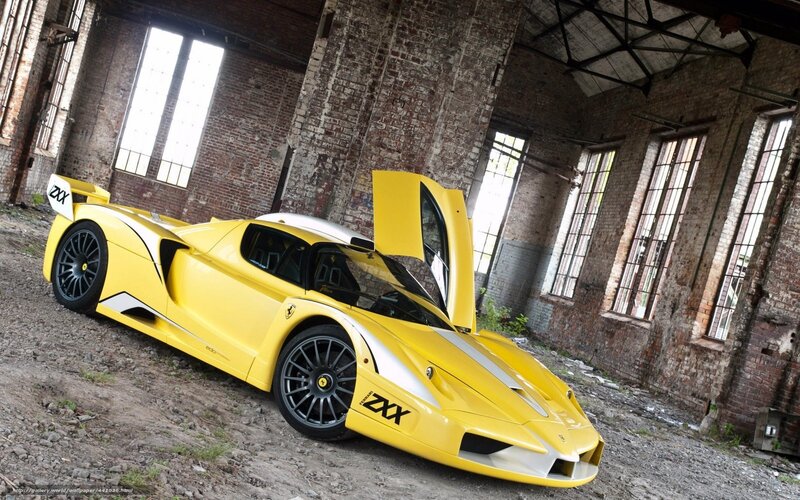 Yellow Ferrari Zxx — Dramatic, Photograph, Brick Building