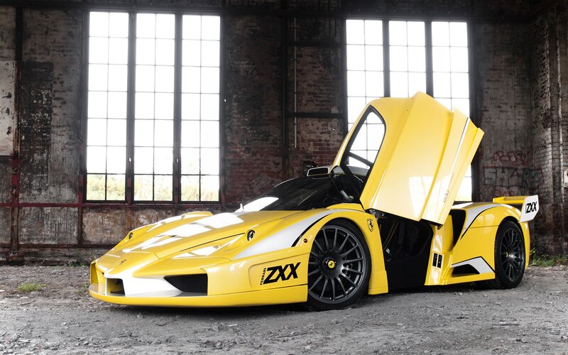 Yellow Ferrari ZXX in warehouse
