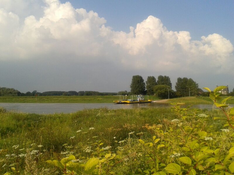 Yellow Ferry on River