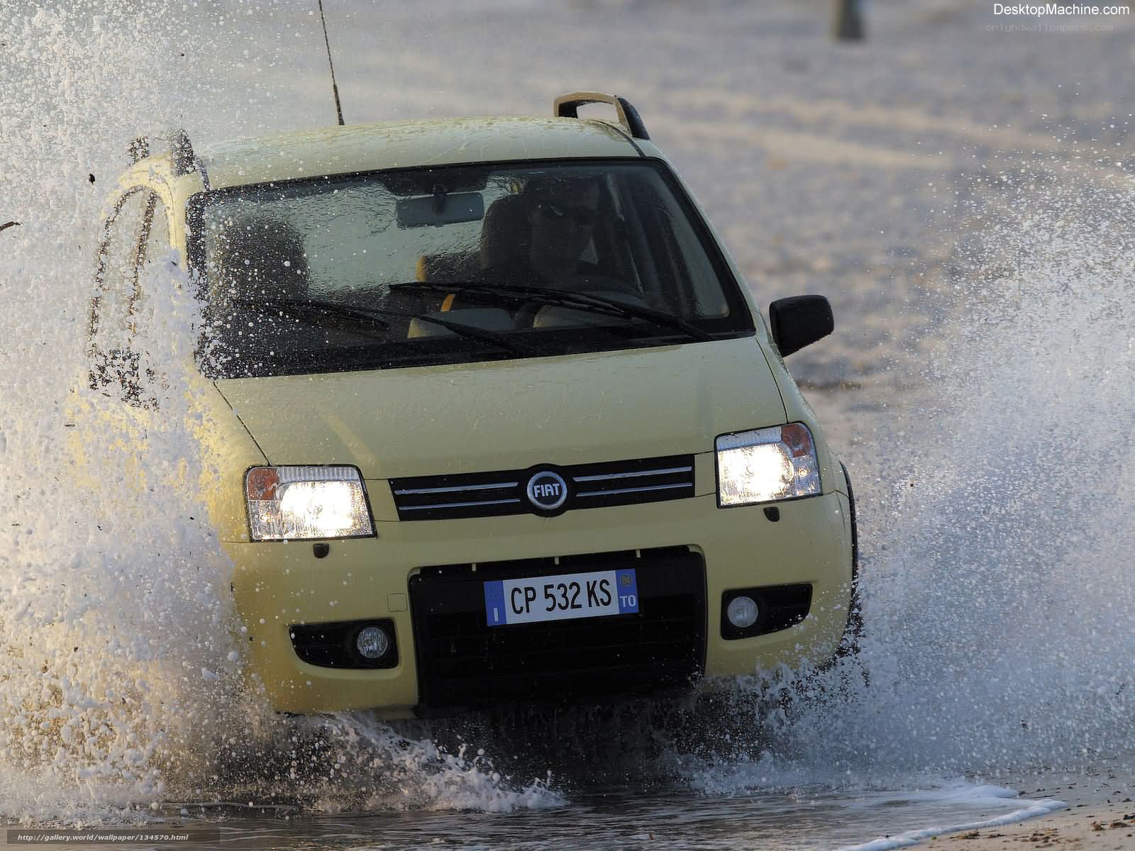 Yellow Fiat driving through water