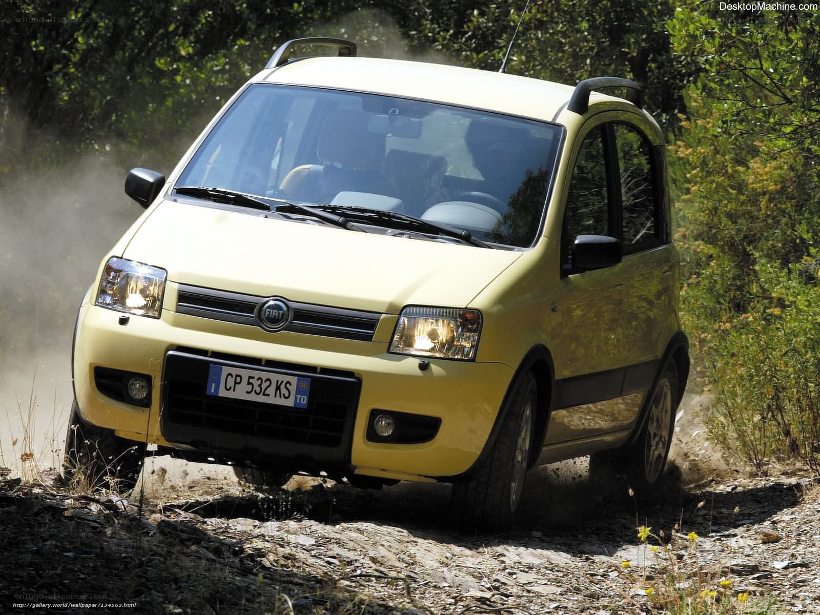 yellow fiat panda on dirt road