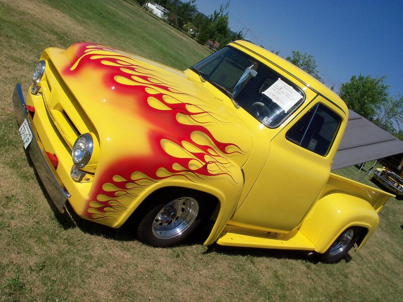 Yellow flame-painted pickup truck