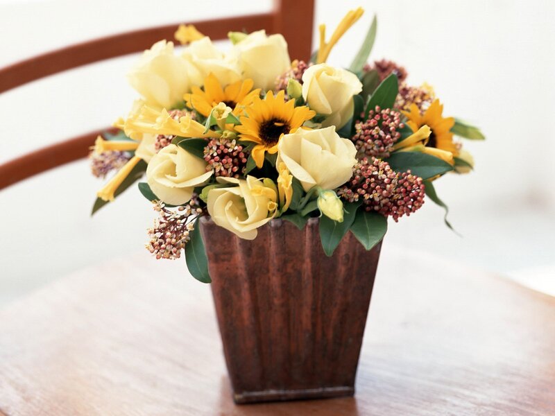 Yellow flower arrangement in vase