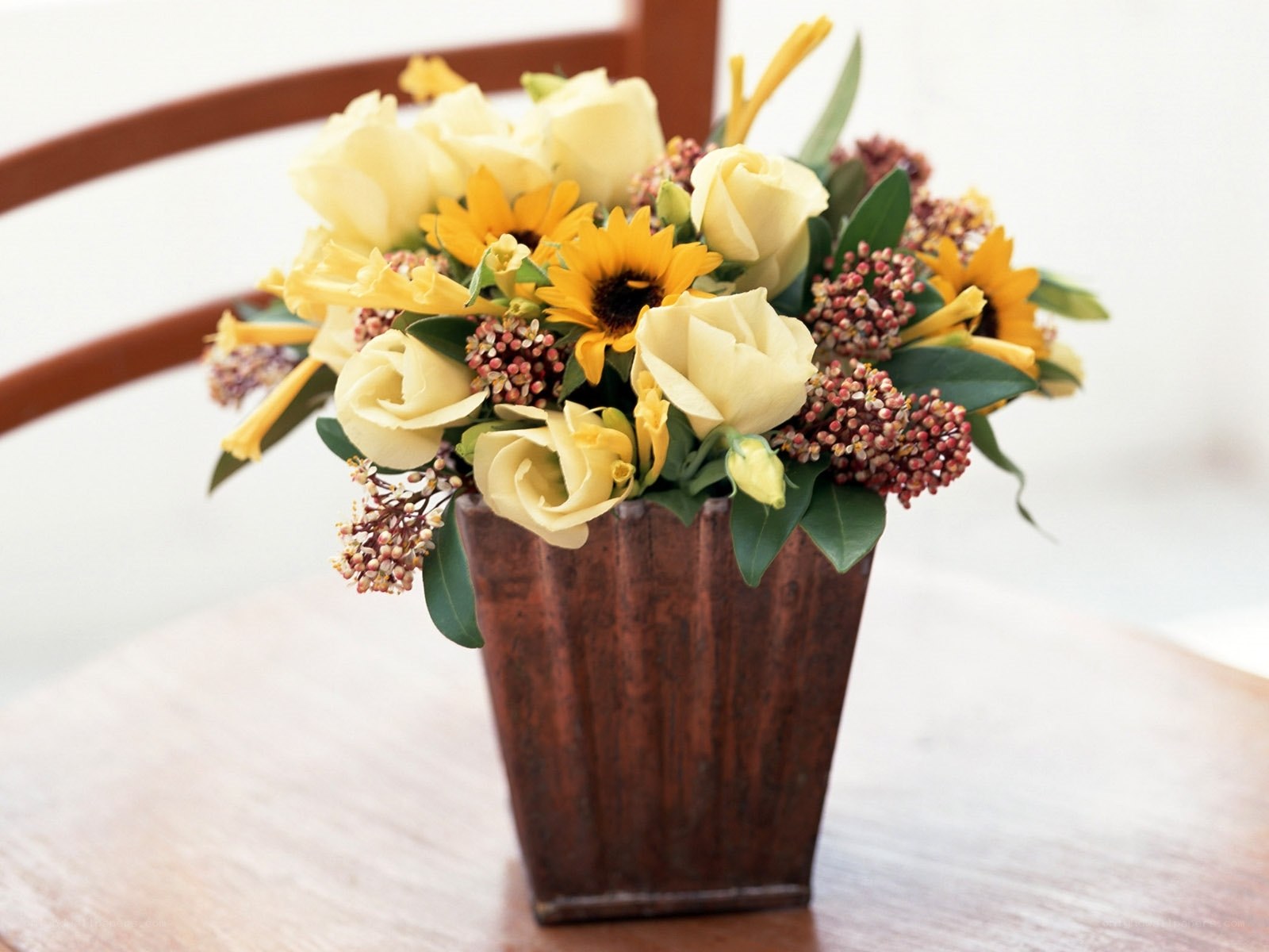 Yellow flower arrangement in vase
