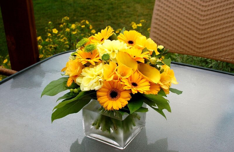 Yellow flower bouquet on table