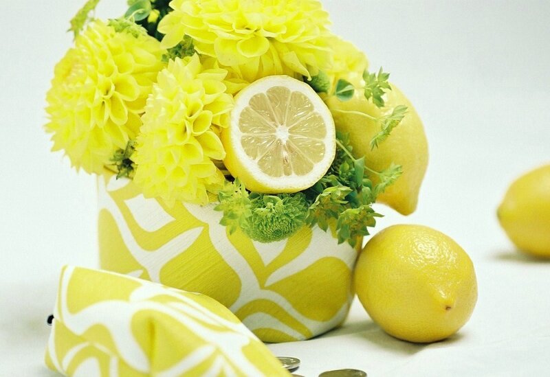 Yellow flowers and lemons