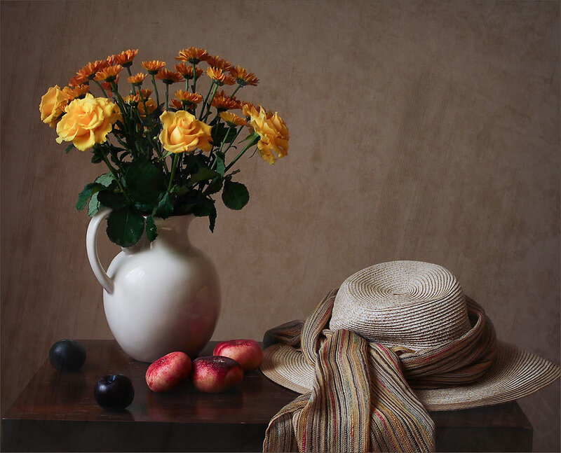 Yellow Flowers in White Pitcher