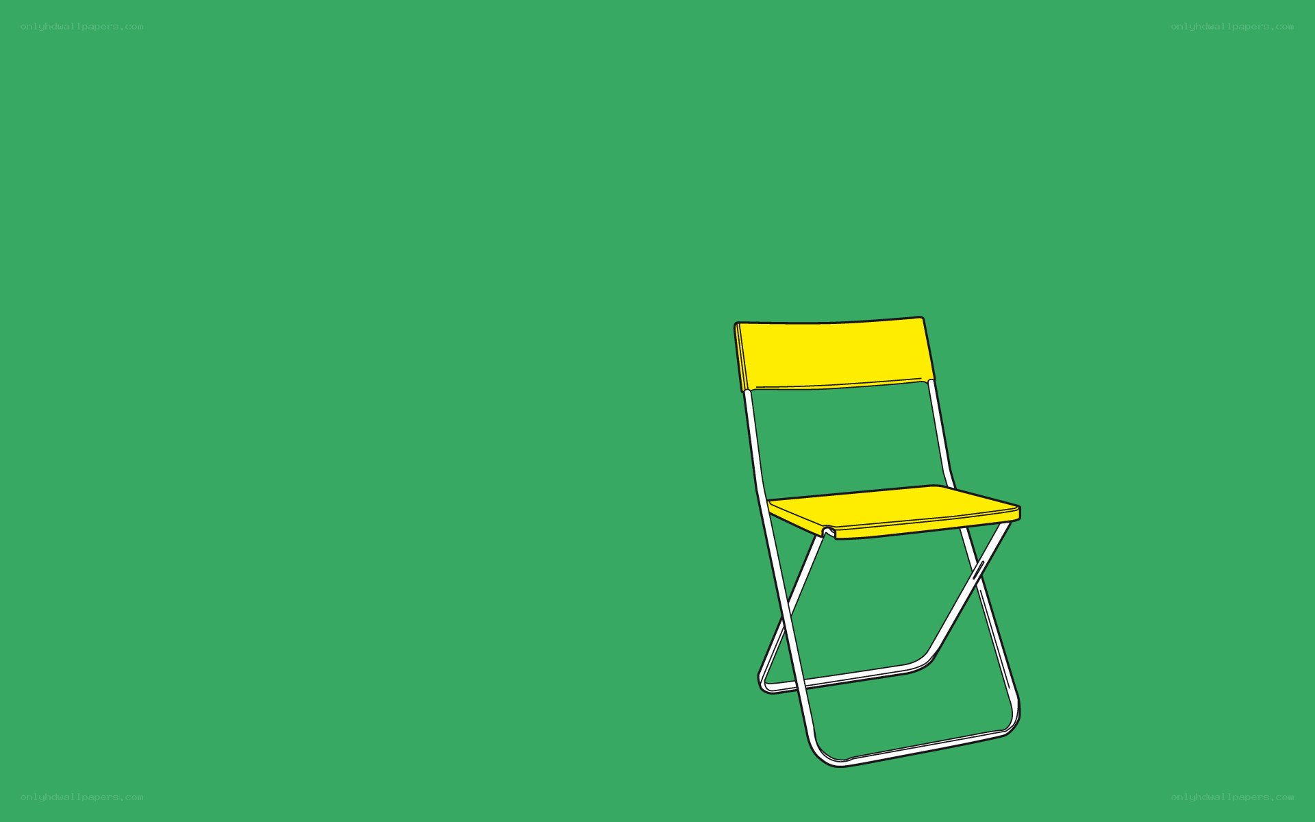 yellow folding chair on green