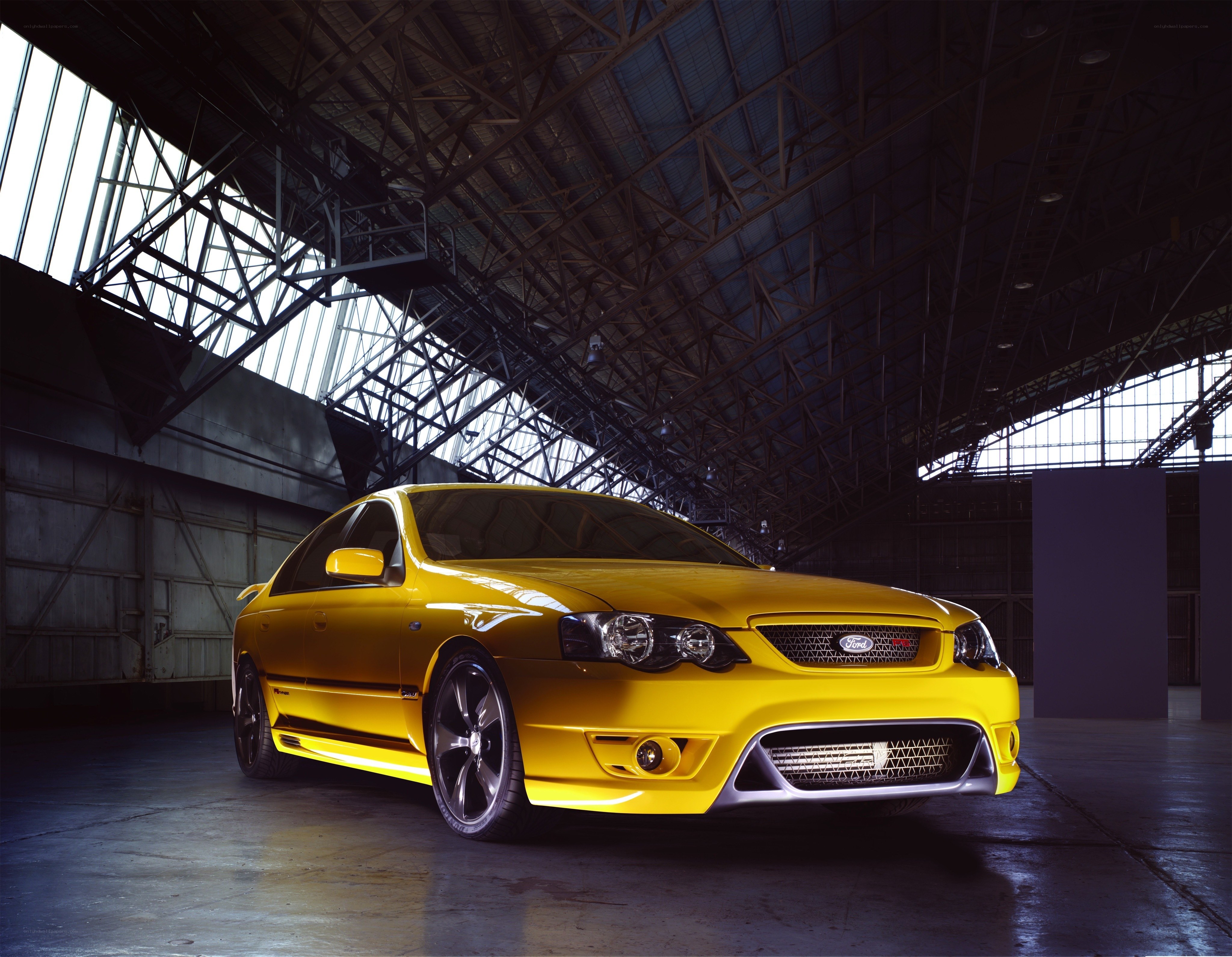 Yellow Ford Falcon in Hangar