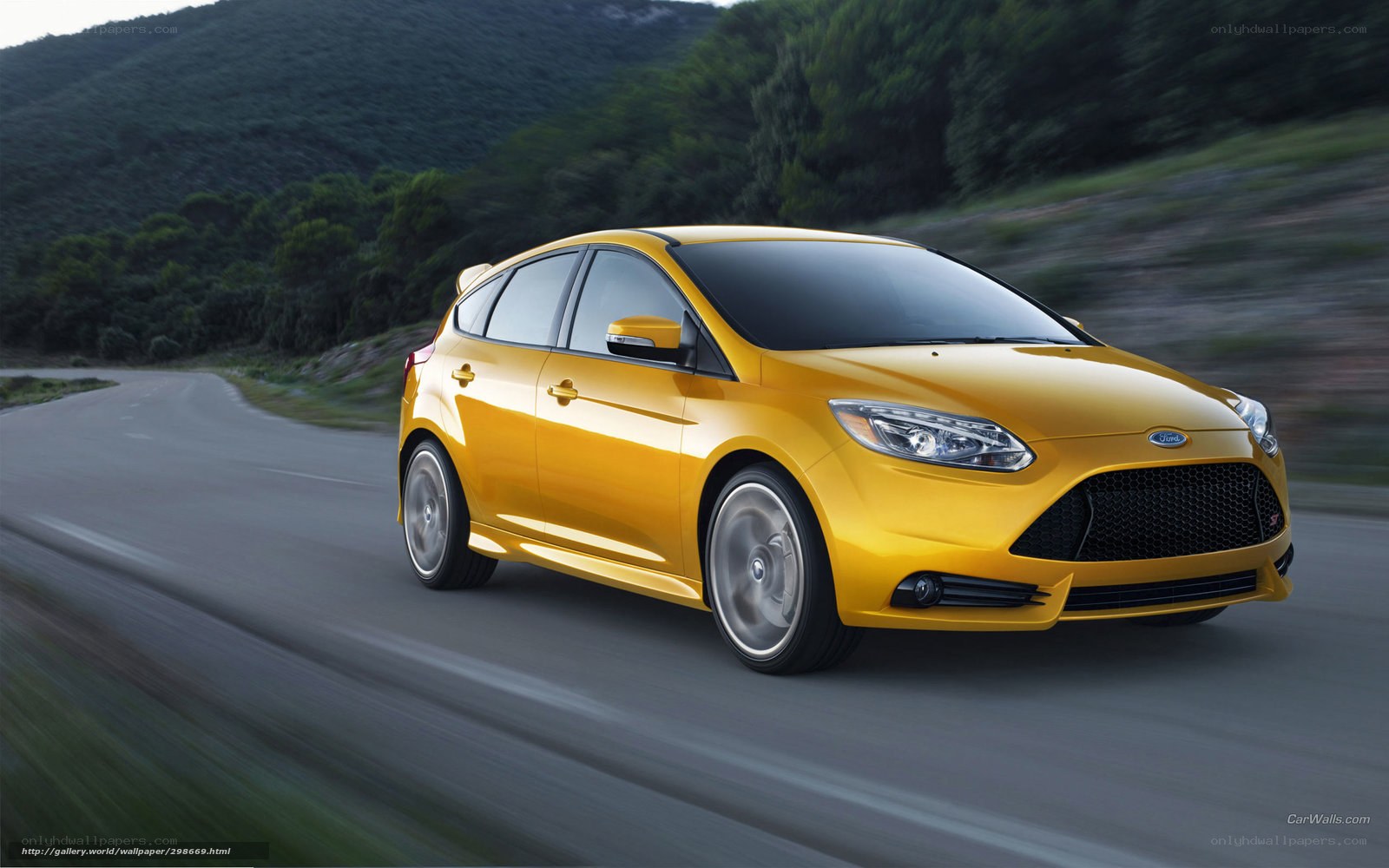 Yellow Ford Focus driving on road