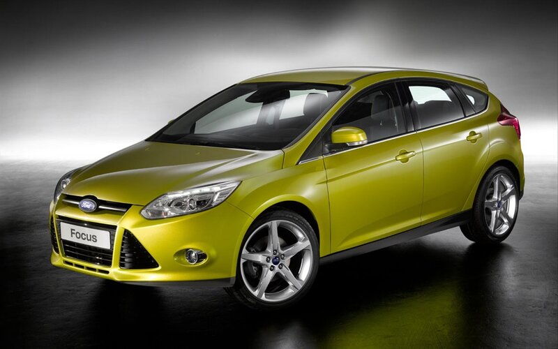 Yellow Ford Focus hatchback