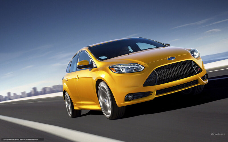 yellow ford focus on road