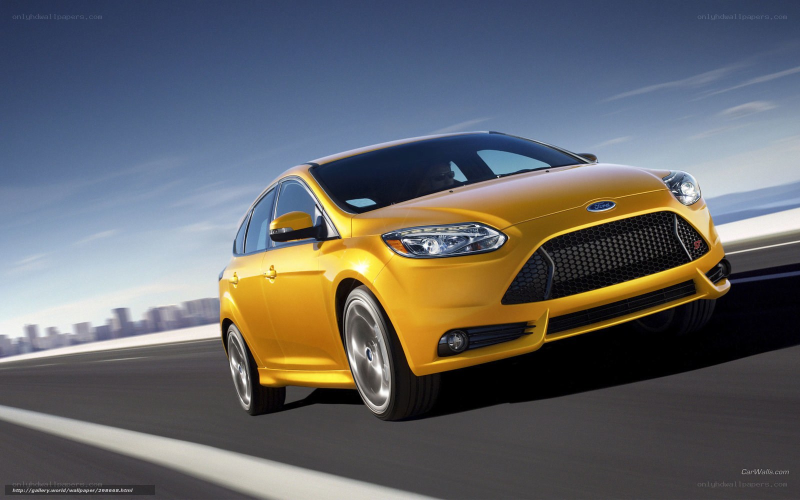 yellow ford focus on road