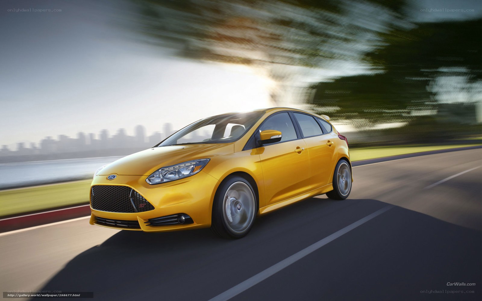 Yellow Ford Focus RS in motion