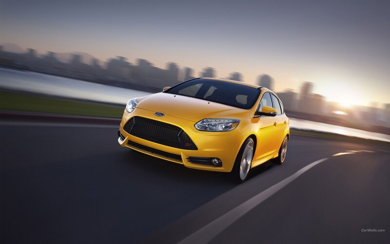 yellow ford focus st driving