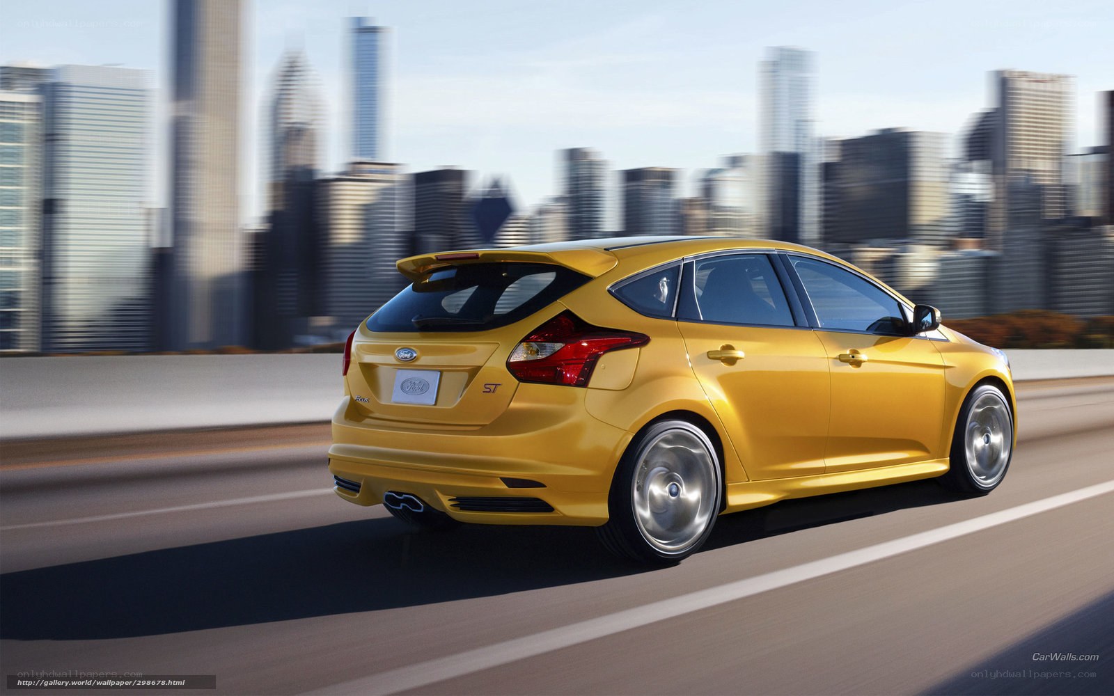 Yellow Ford Focus ST in city