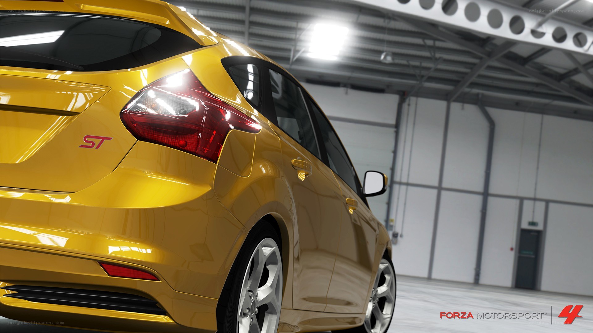 Yellow Ford Focus ST in garage