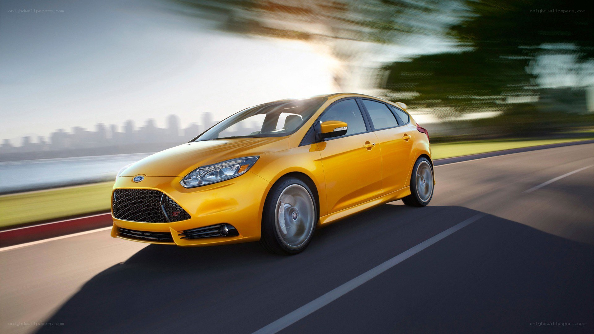 yellow ford focus st in motion