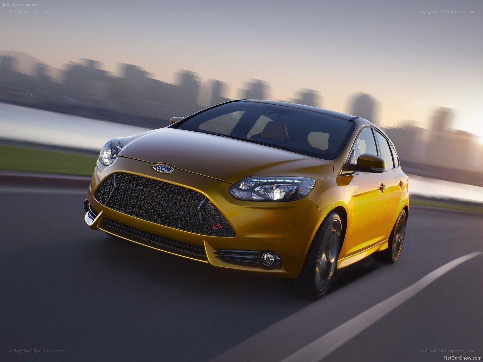 Yellow Ford Focus ST in motion