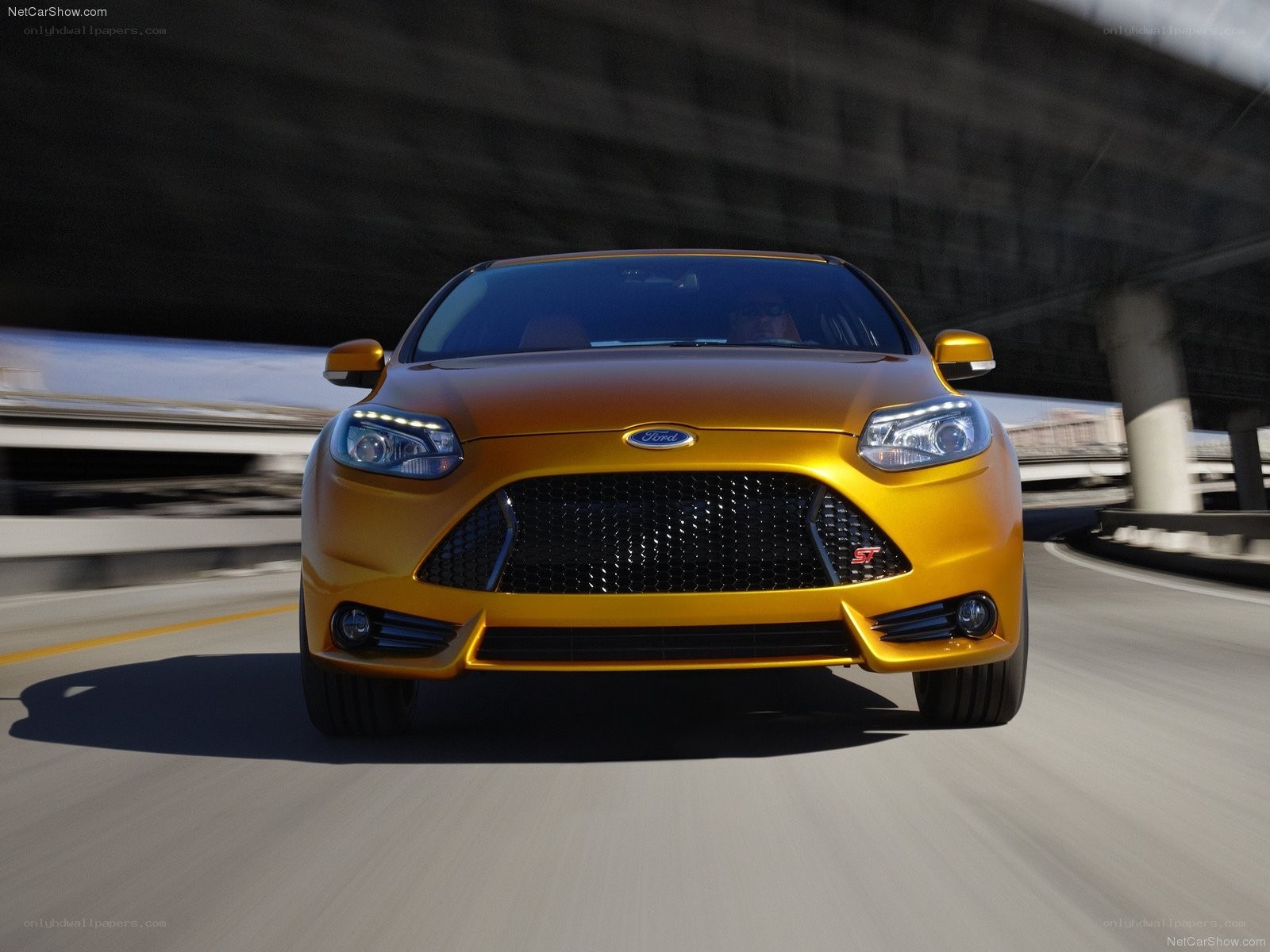 yellow ford focus st in motion