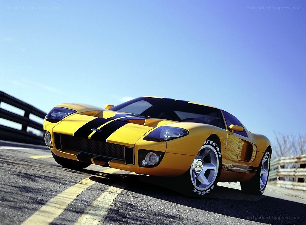 Yellow Ford GT on a racetrack