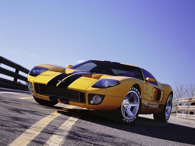 Yellow Ford GT on a racetrack
