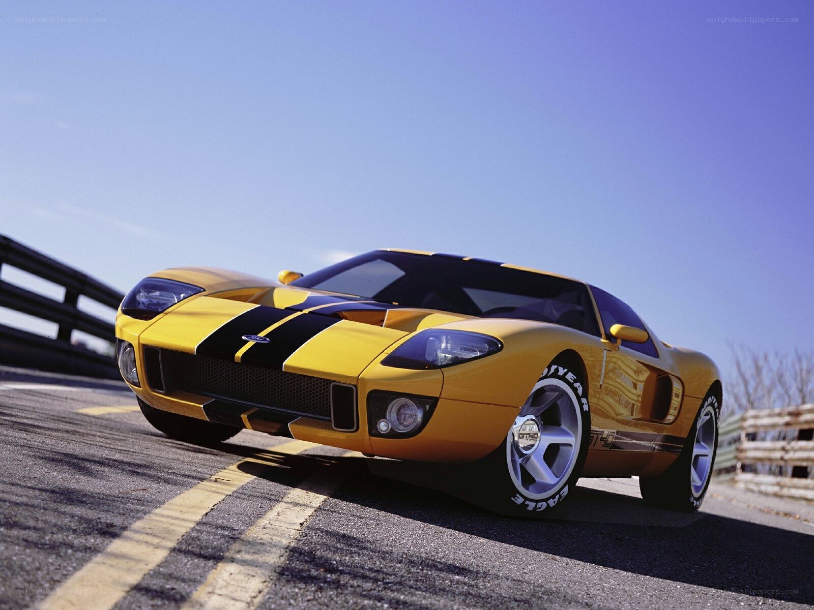 Yellow Ford GT on a racetrack